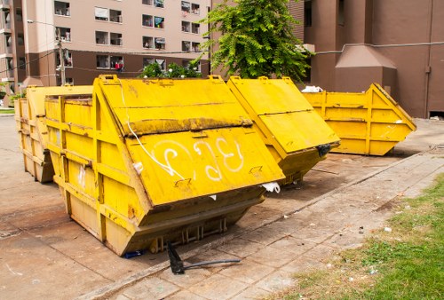 Workers sorting construction debris