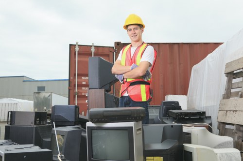 Workers sorting materials at a local transfer station